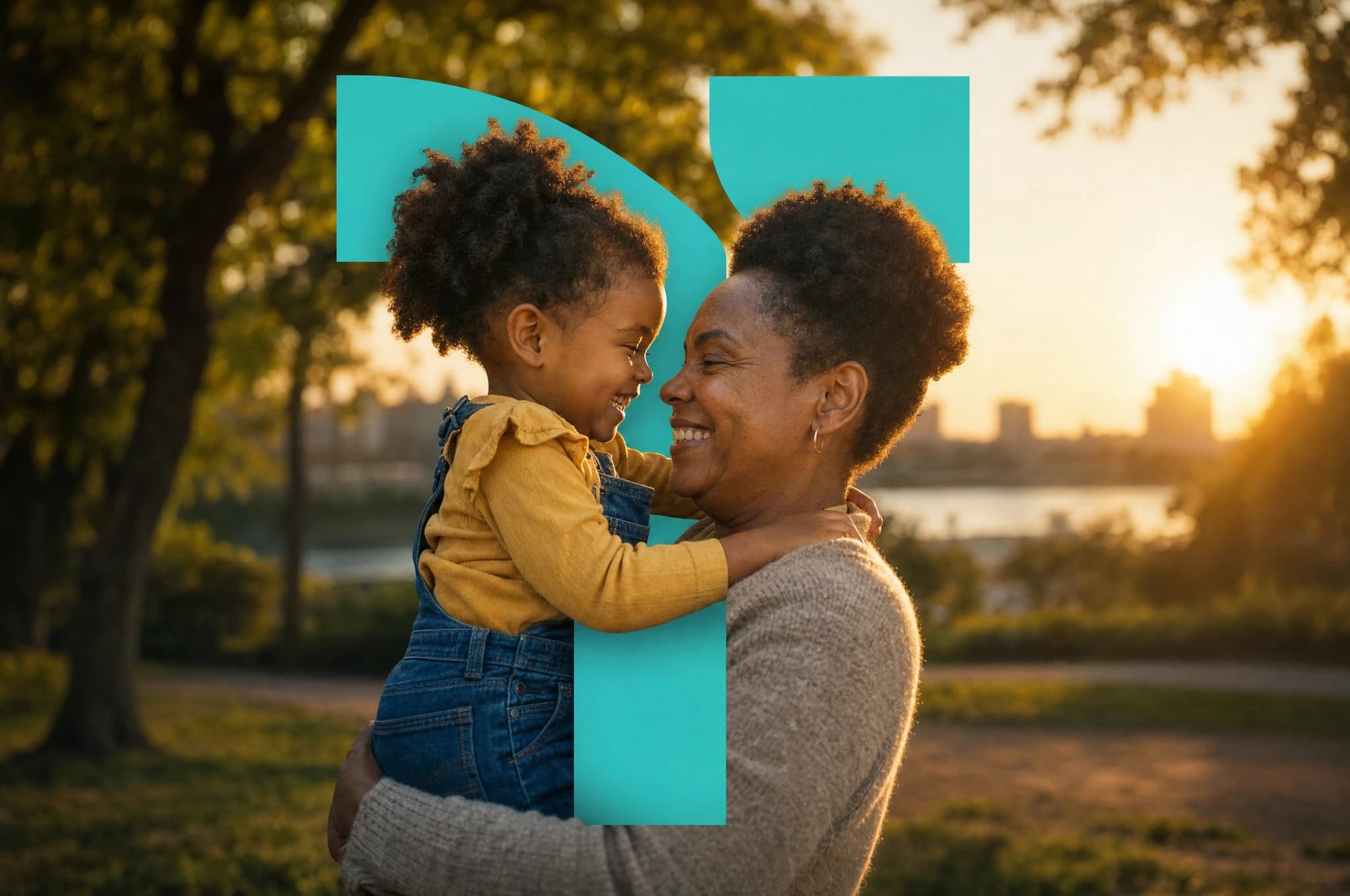 Mother and daughter sharing a loving moment in a park at sunset